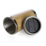 18644 Copo Bambu 500ml Descrição_ Copo Bambu de 500ml, parte interna em inox. Possui tampa com compartimento que pode ser aberto para beber.